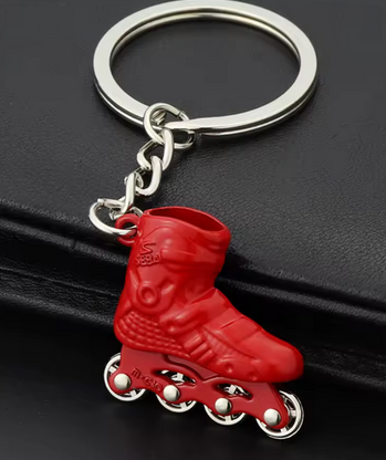 LLAVEROS DE PATINES RUEDAS DE METAL